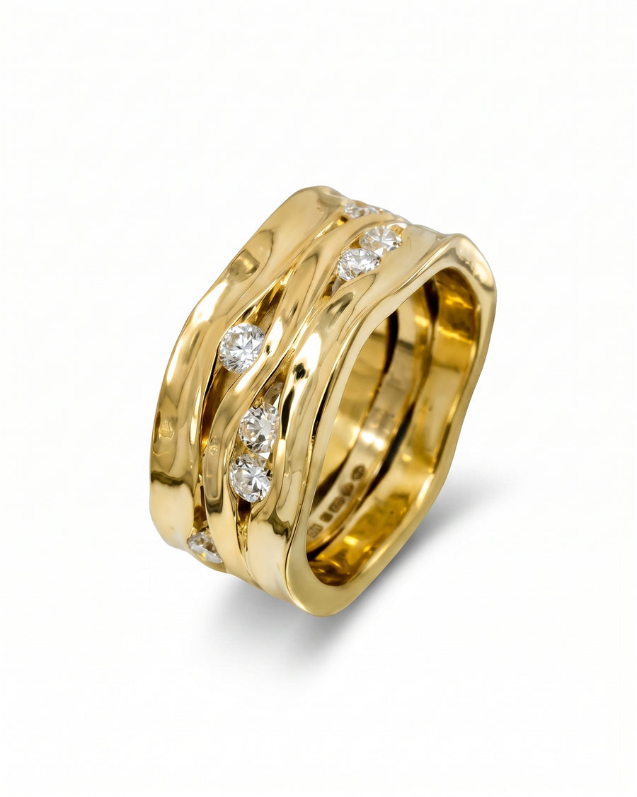 9ct yellow gold wide three-band eternity ring with diamonds.