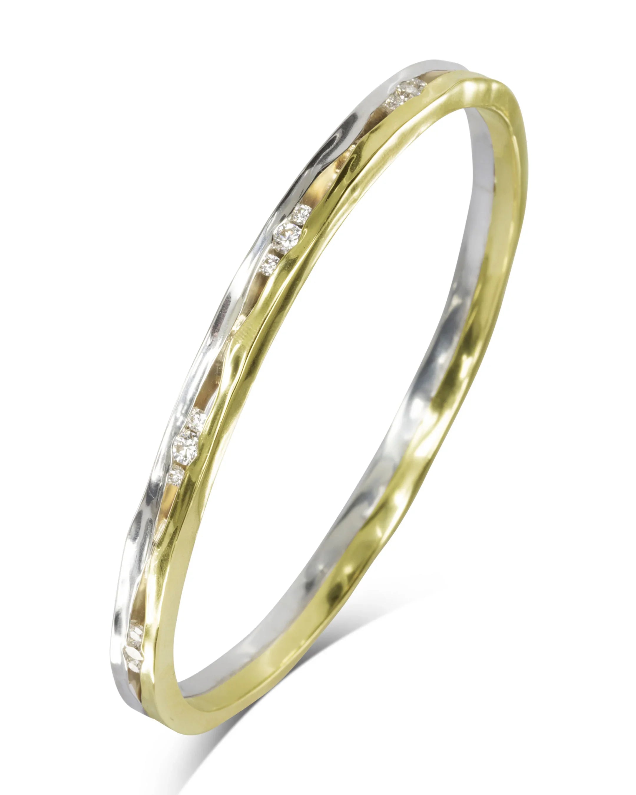 Mixed metal bangle with gold and silver tones, set with small sparkling diamonds