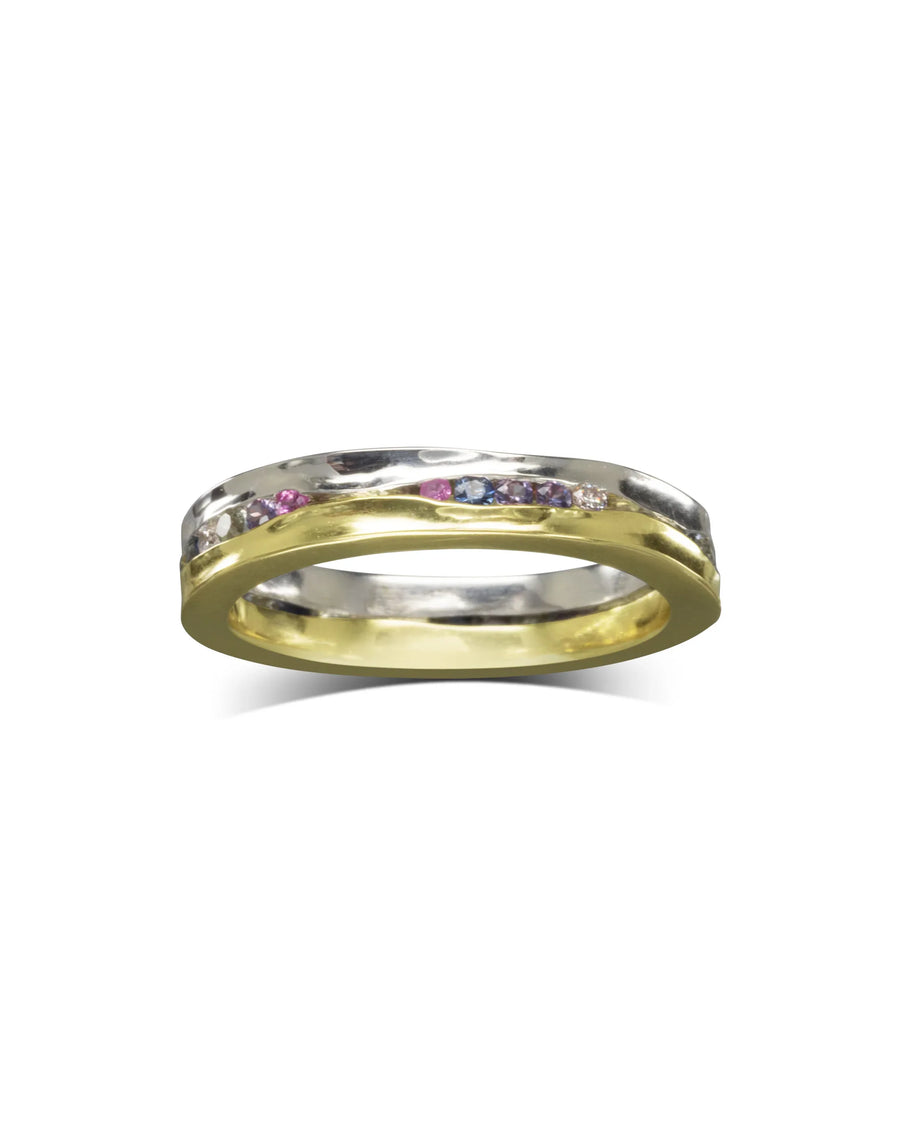 Yellow gold and silver ring with diamonds, pink, and blue sapphires.