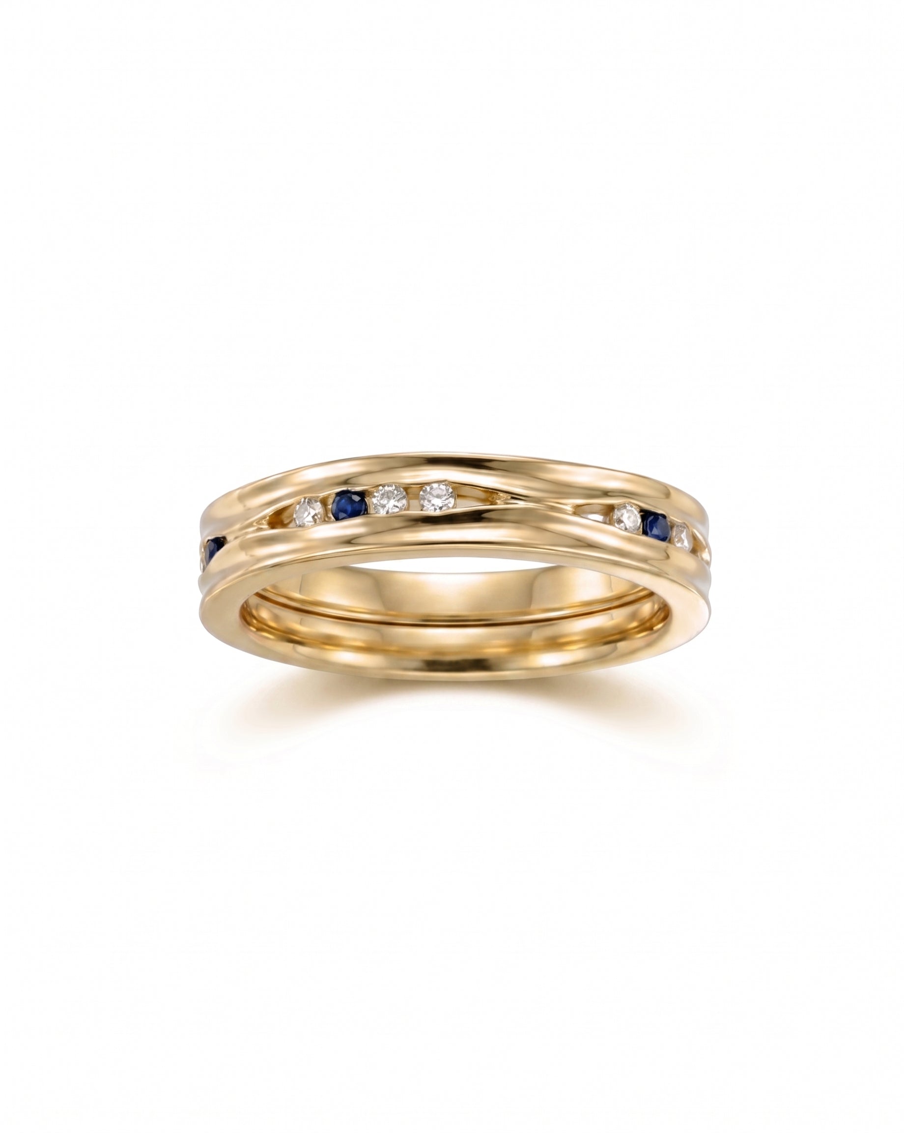 Yellow gold ring with alternating diamonds and sapphires.