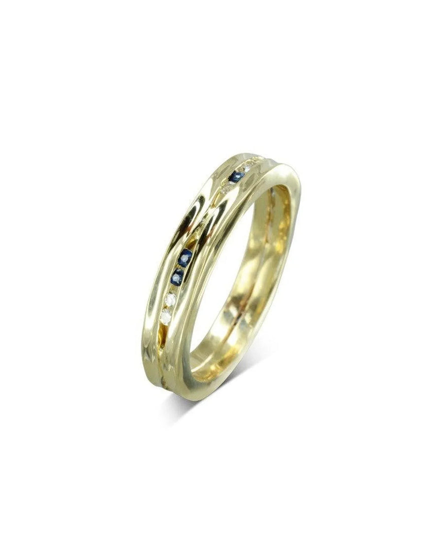 Yellow gold narrow ring with diamonds and sapphires.