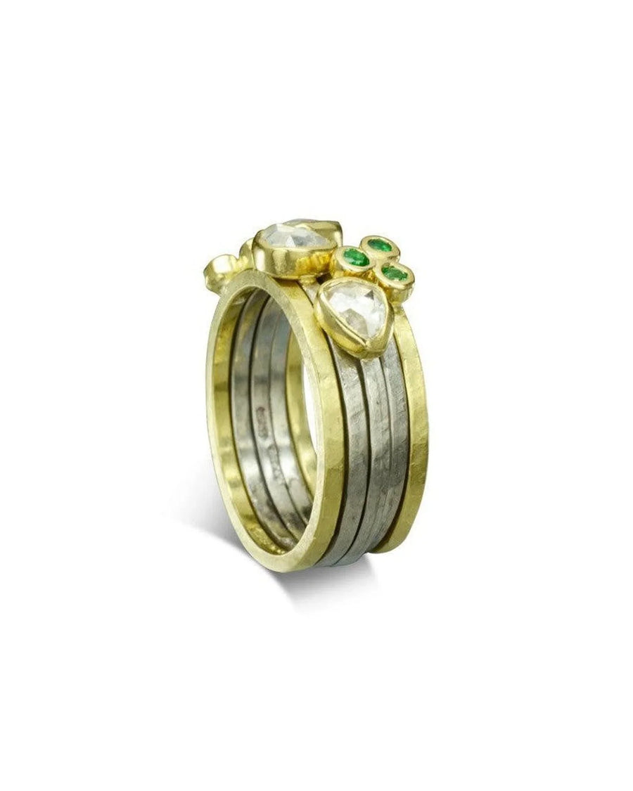 Gold and silver stacking ring set with rough diamonds and green gemstones
