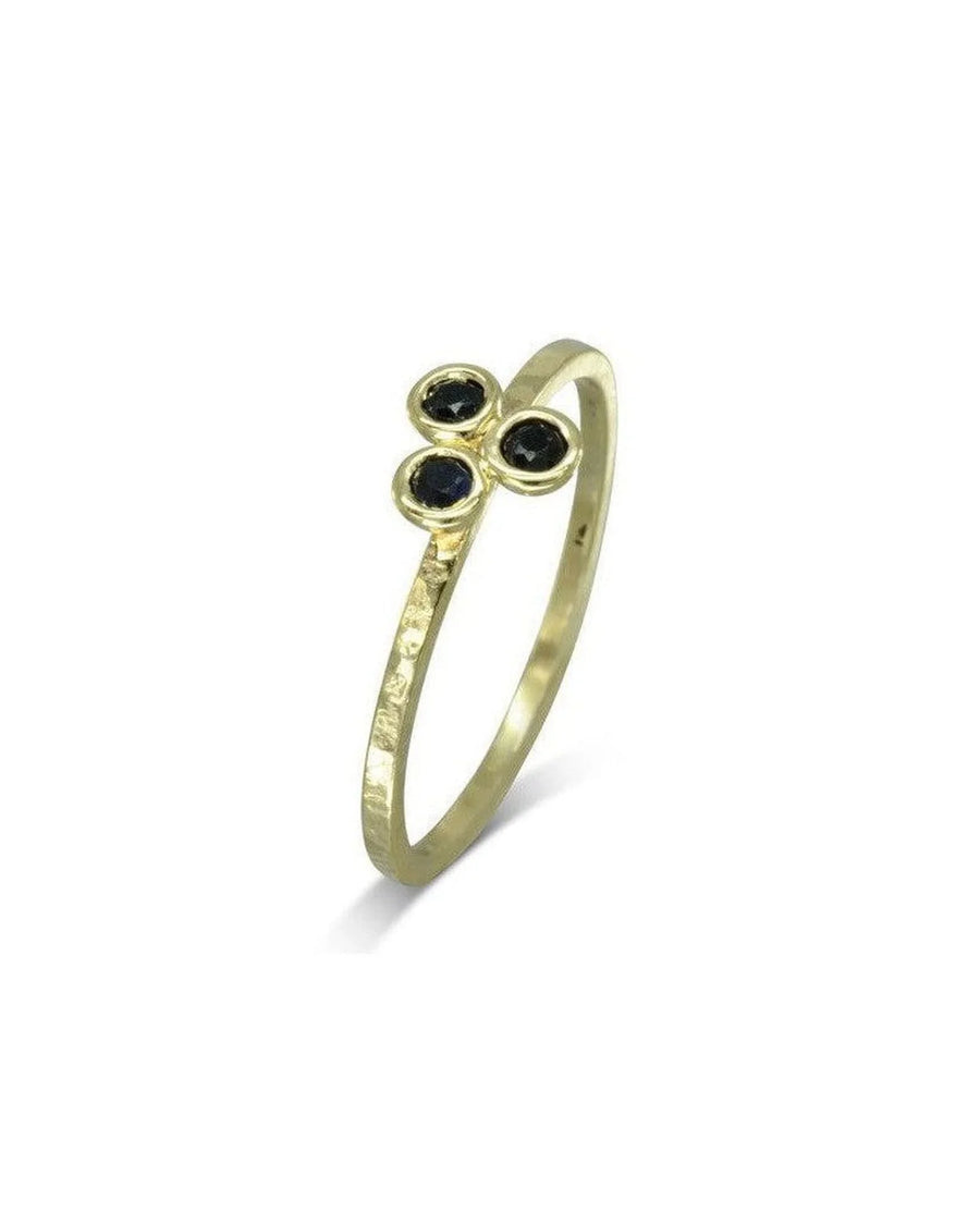 9ct yellow gold ring with three round black sapphire gemstones in a trefoil design.