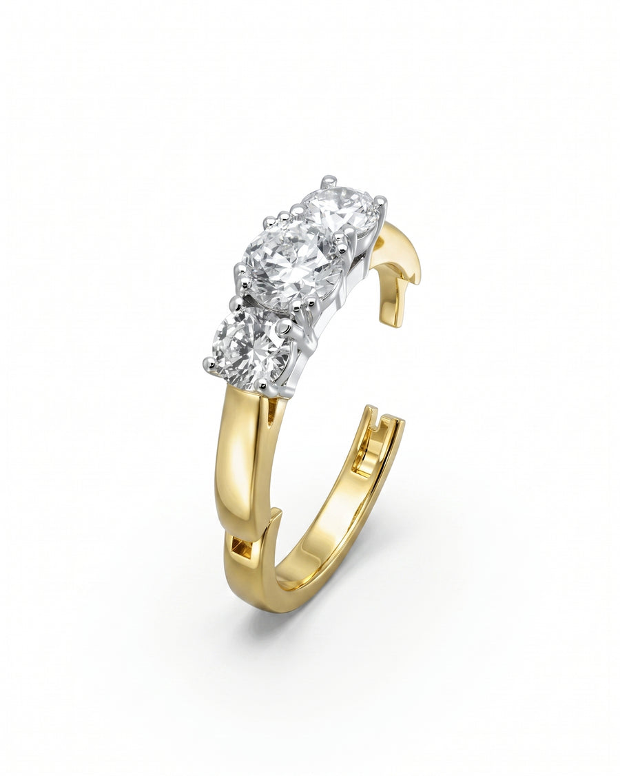 Gold hinged engagement ring with three round diamonds.