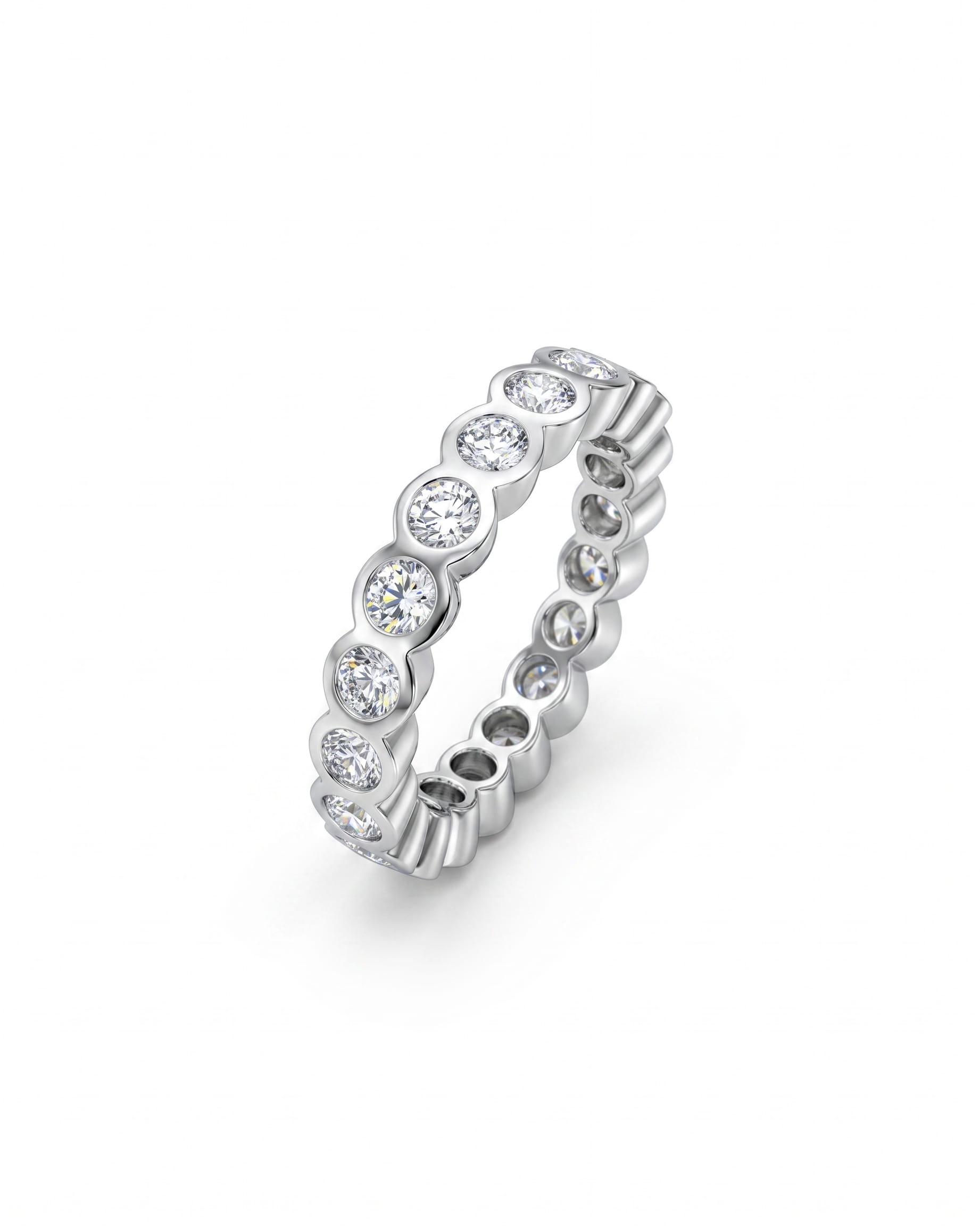 Platinum full eternity ring with bezel-set round diamonds.