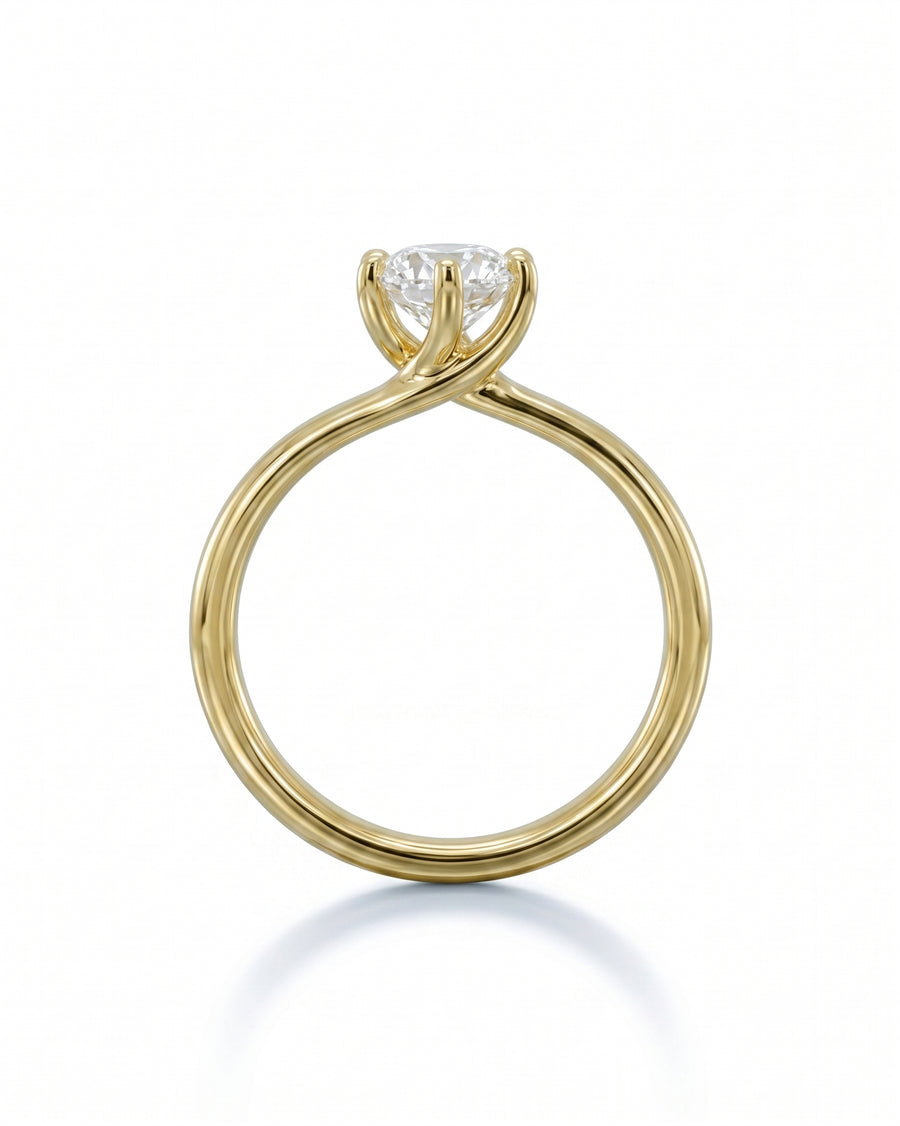 Yellow gold twist oval diamond engagement ring.