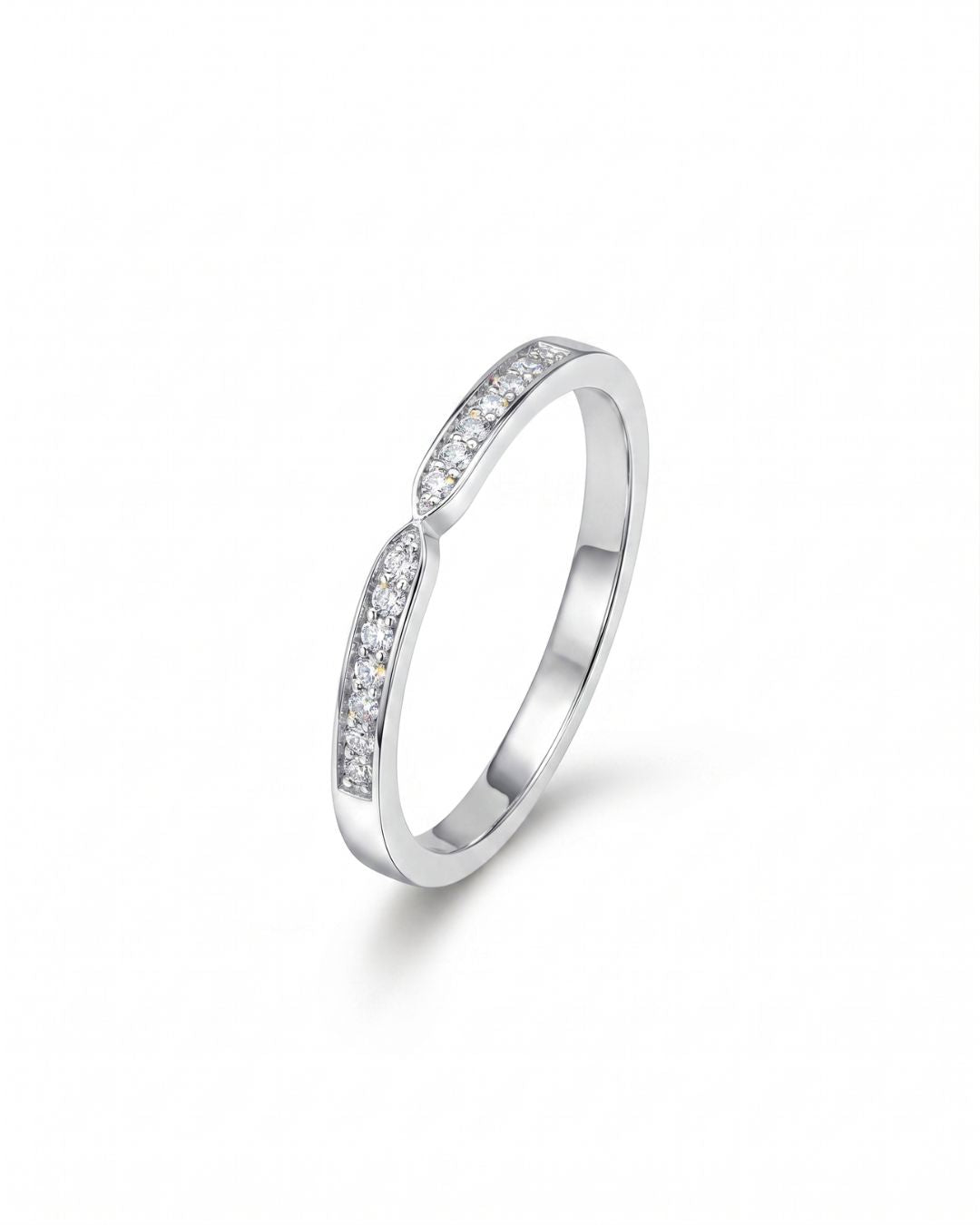 Platinum twist pavé set diamond ring.