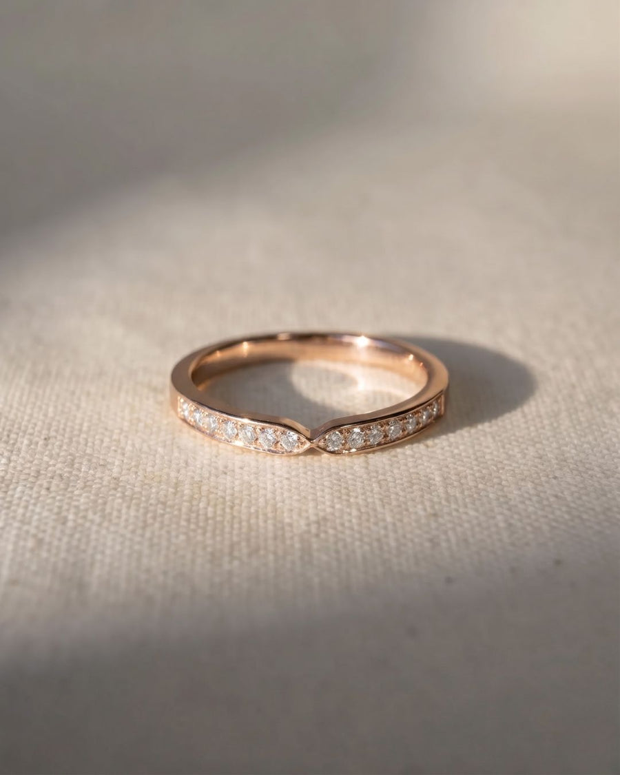 9ct rose gold twist pavé set diamond ring.