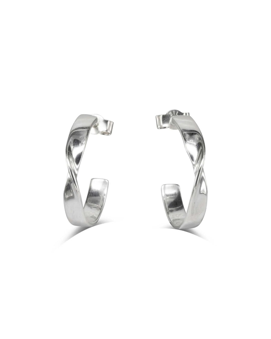 Twist design silver hoop earrings on white background, modern handmade jewelry