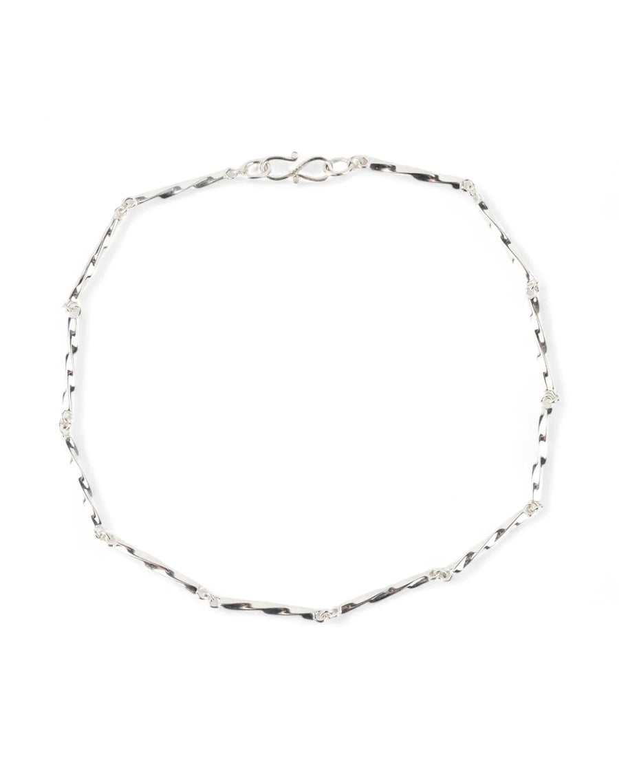 Handmade silver twisted chain necklace with unique textured links on white background