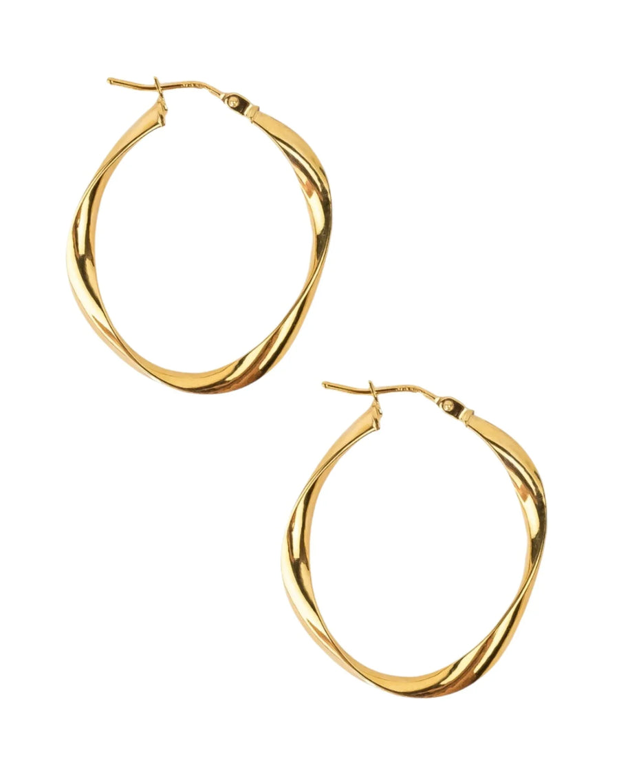 Organic twisted gold hoop earrings with a handcrafted, uneven shape on a white background