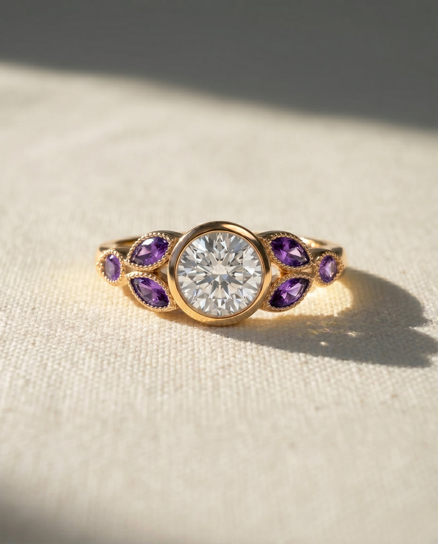 18ct yellow gold ring with a round diamond and marquise amethysts.