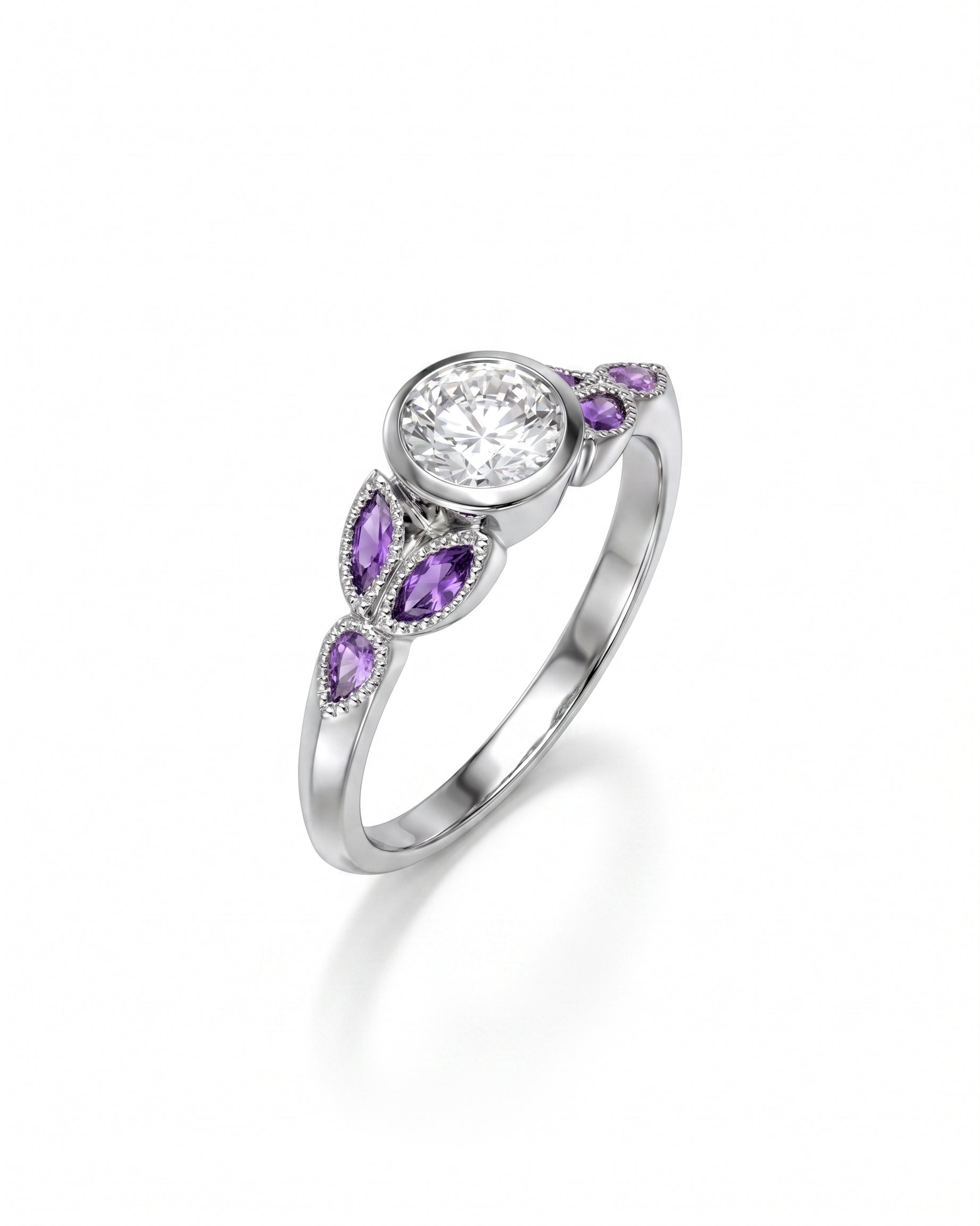 Silver ring with a round diamond and marquise-cut amethyst side stones.