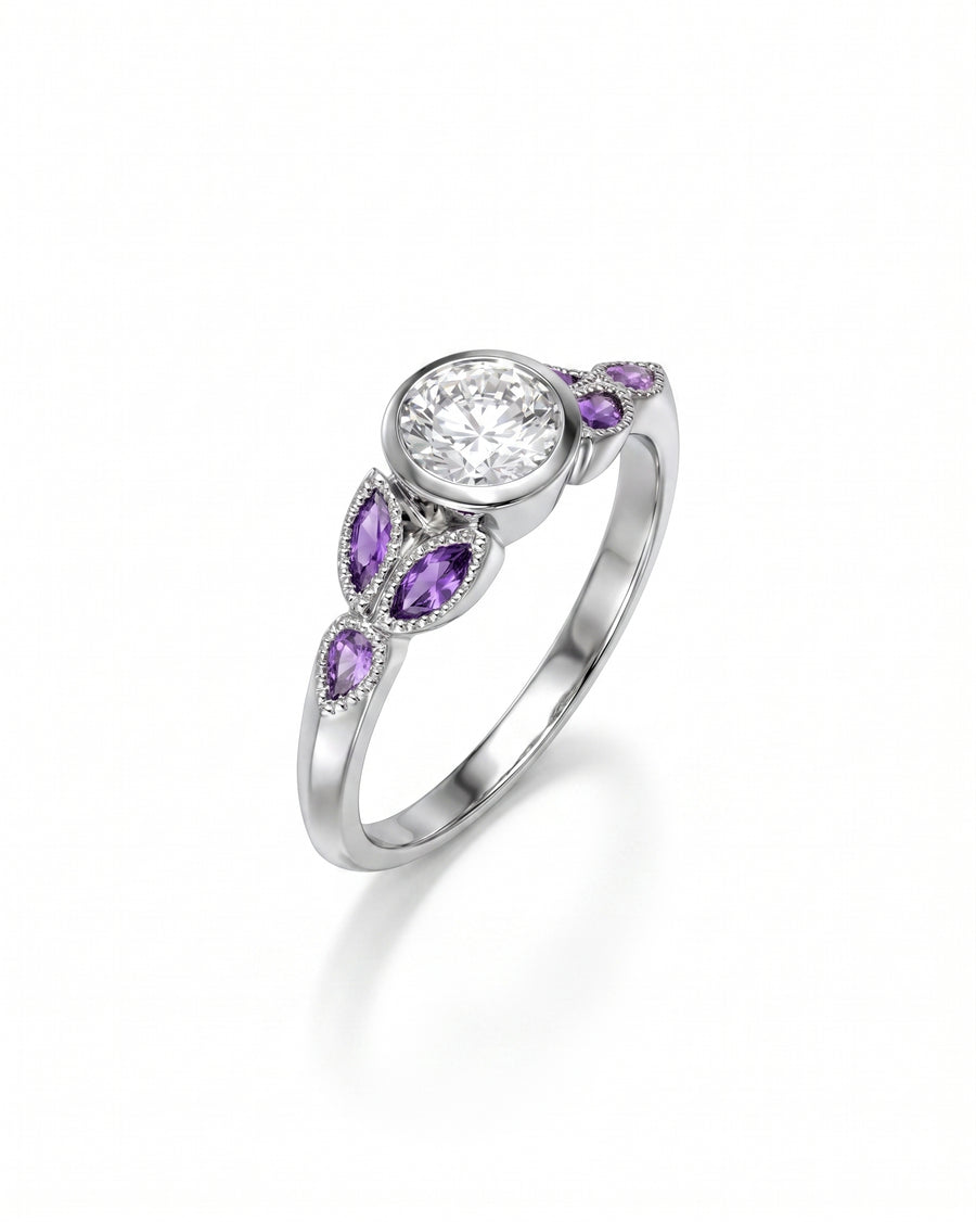 Silver ring with a round diamond and marquise-cut amethyst side stones.
