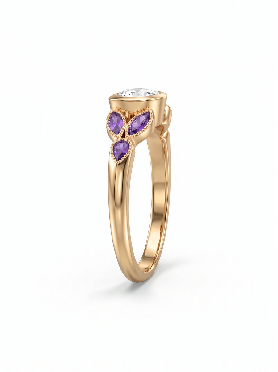 Gold engagement ring with a round center stone and marquise-cut amethyst side accents in a bezel setting.