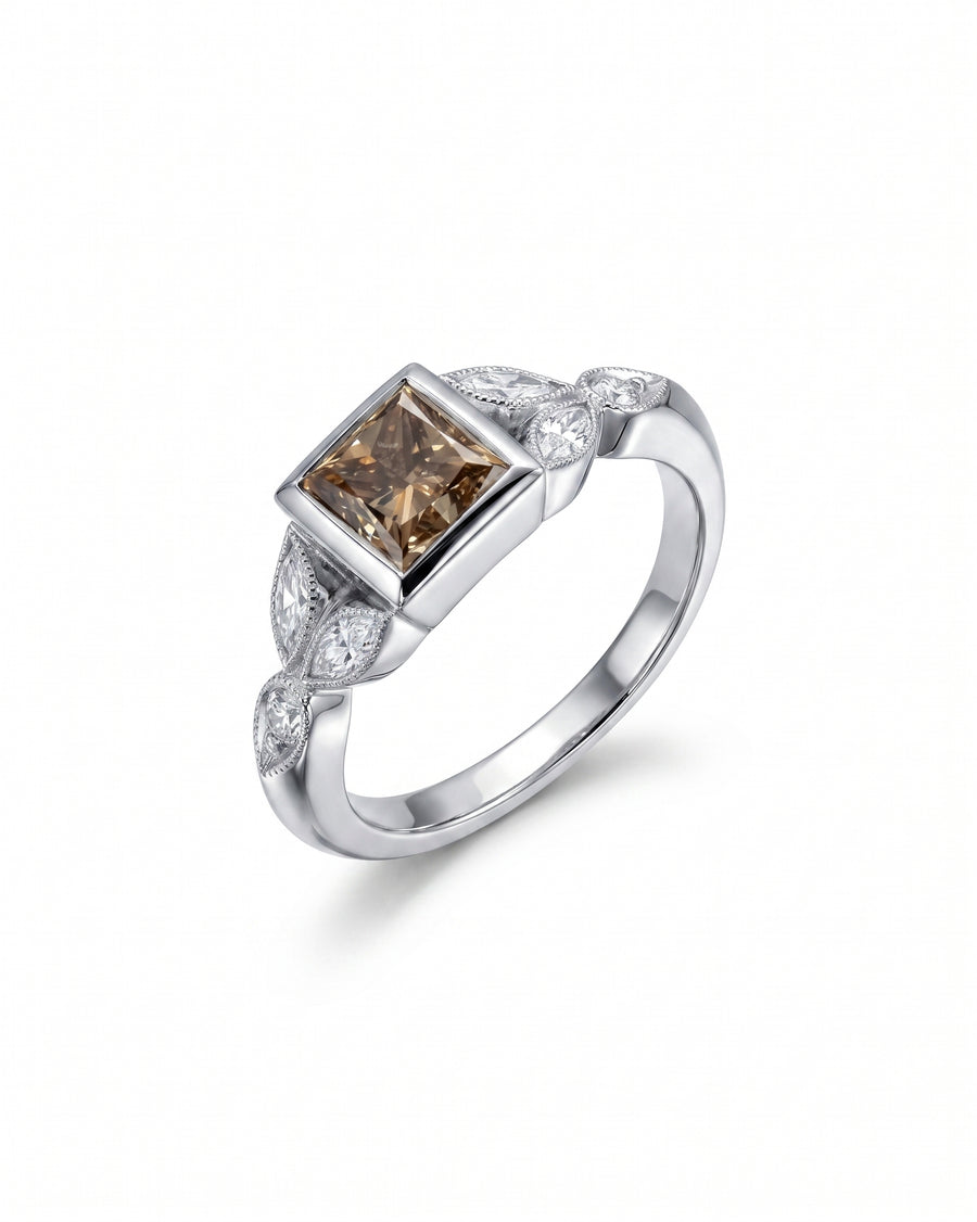 Platinum engagement ring with a square cappuccino diamond and marquise side stones.