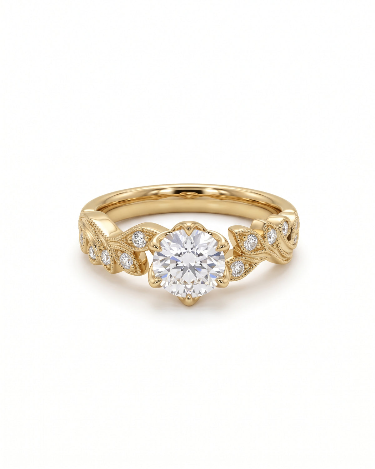 Gold engagement ring with a round diamond center stone and leaf-shaped bands featuring small accent diamonds.