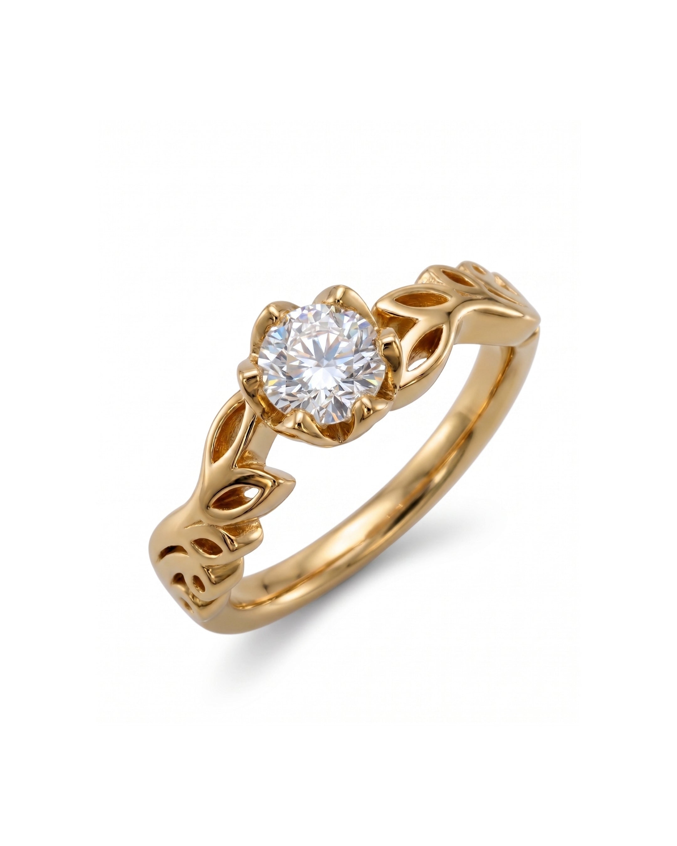 Gold ring with a round diamond and leaf-shaped band.