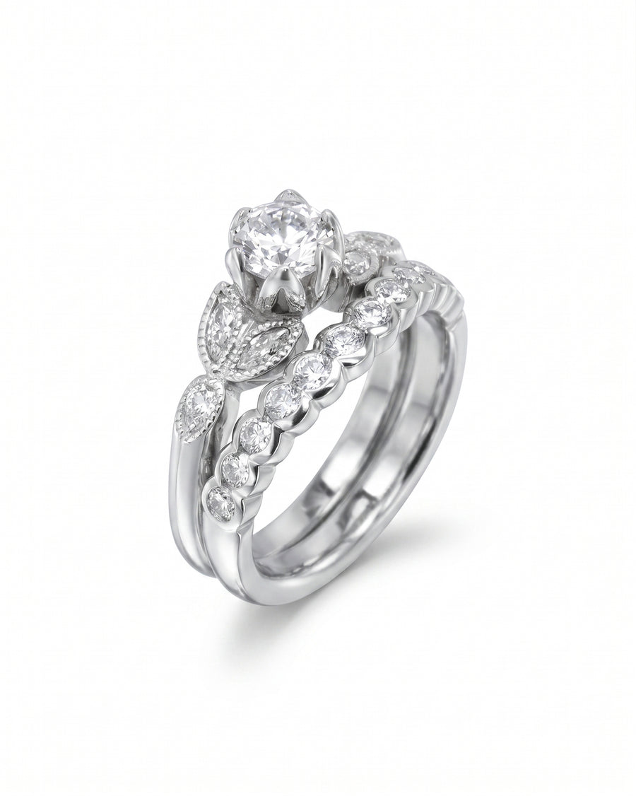 White gold vintage diamond engagement and wedding ring set.