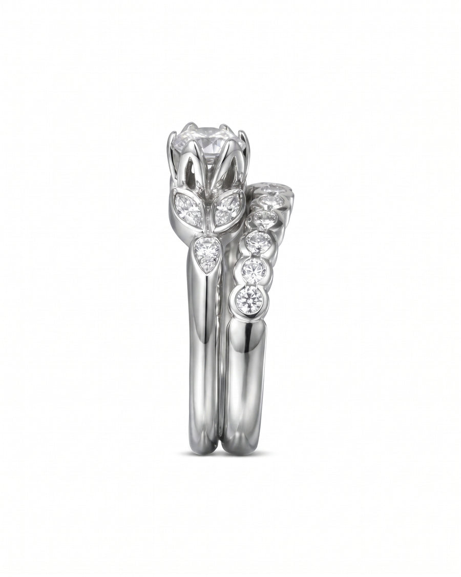 Vintage diamond engagement and wedding ring set in white gold.