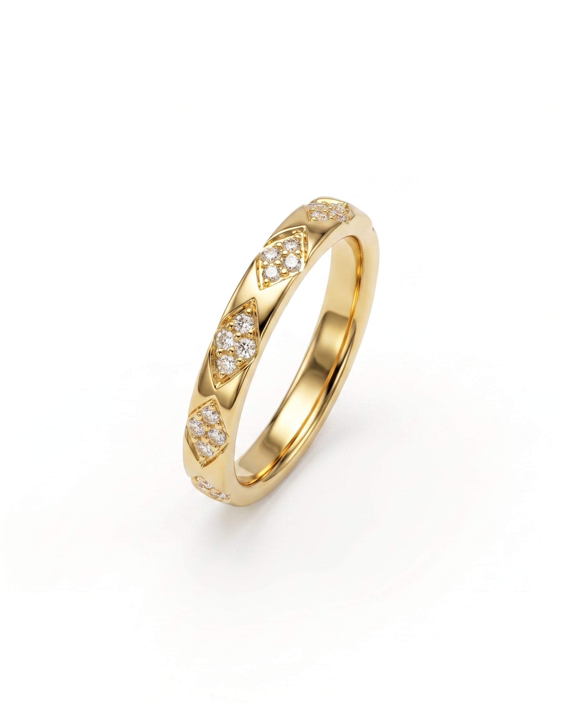 Gold ring with diamond pattern and small diamonds.