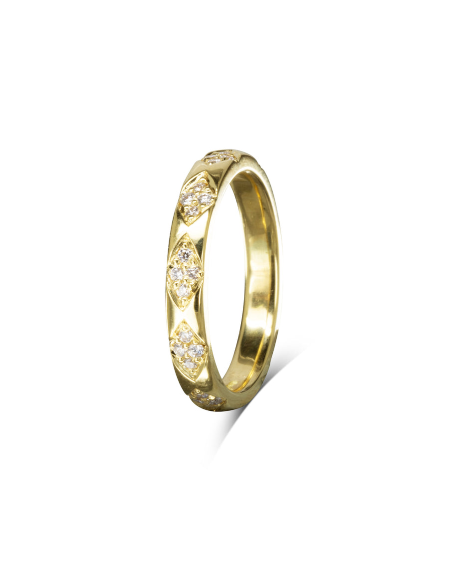 Gold ring with diamond pattern.