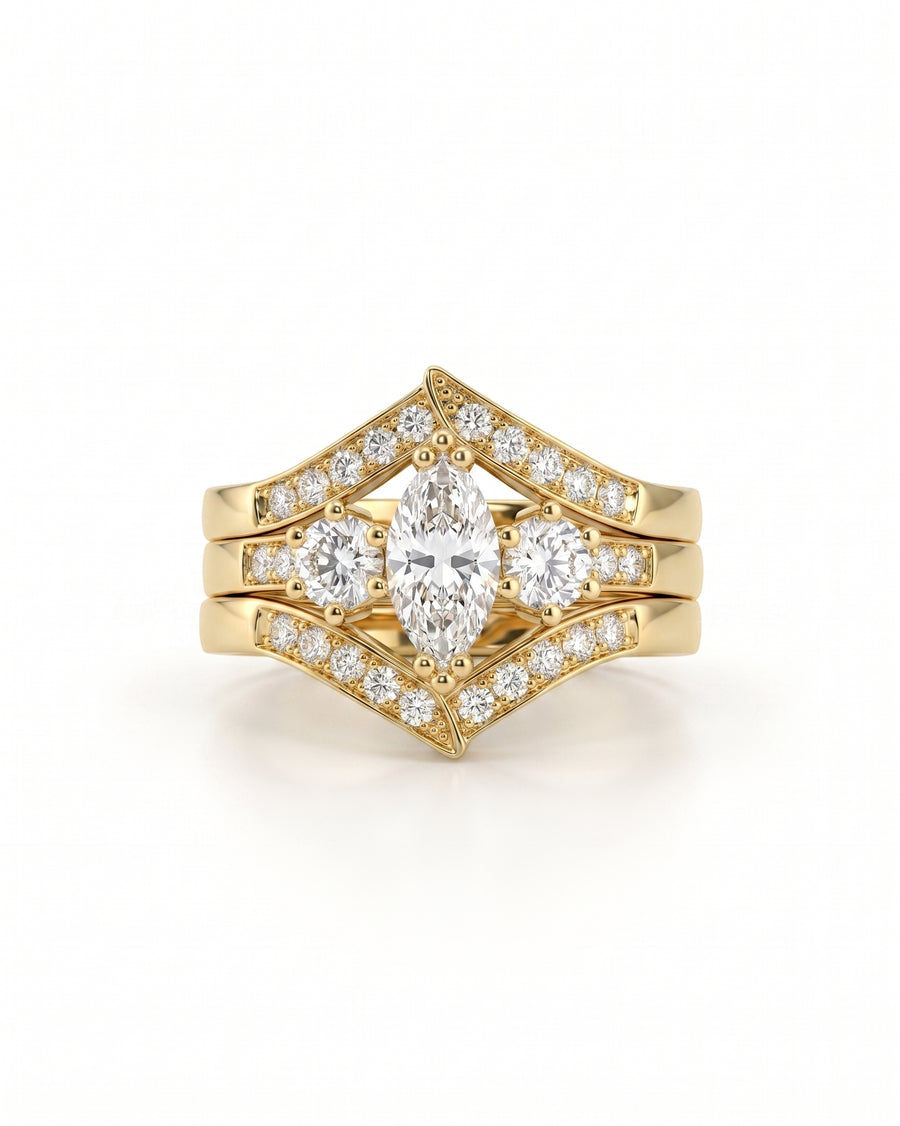Gold marquise cut diamond engagement wedding ring set with round side stones.