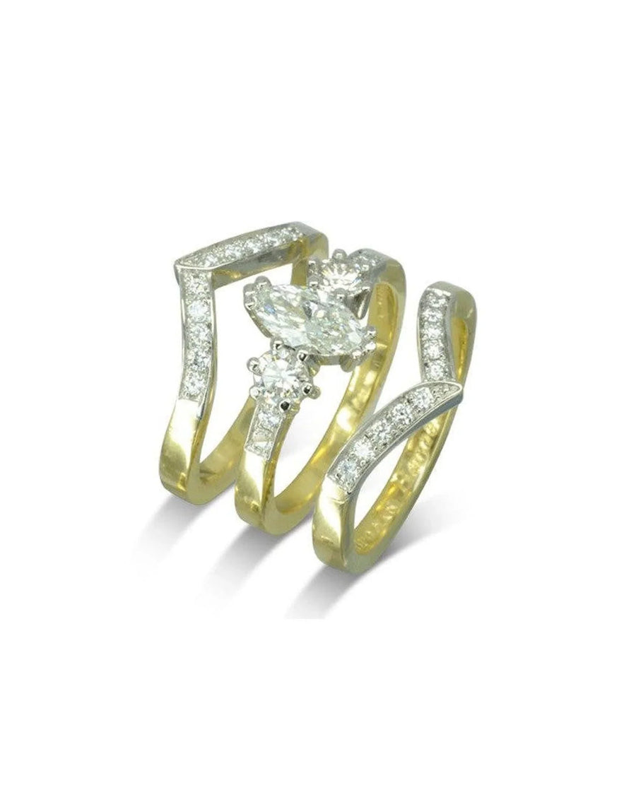 Gold marquise cut diamond engagement wedding ring set with pave diamonds.