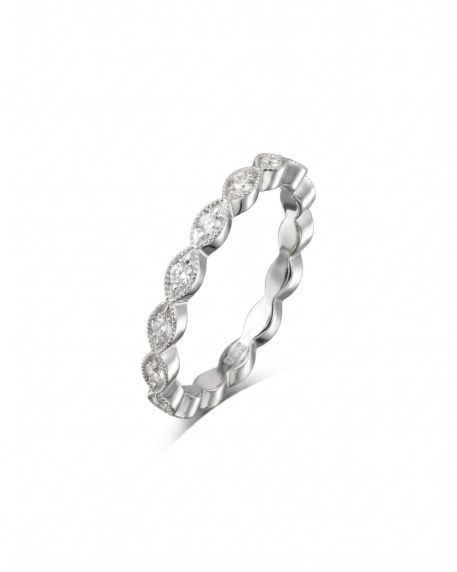 Silver ring with marquise-shaped diamonds.