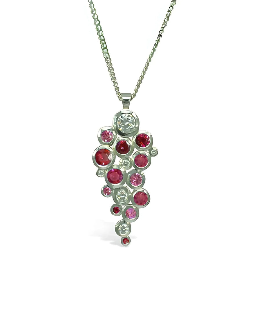 9ct white gold pendant with ruby, pink sapphire, and diamond cluster.