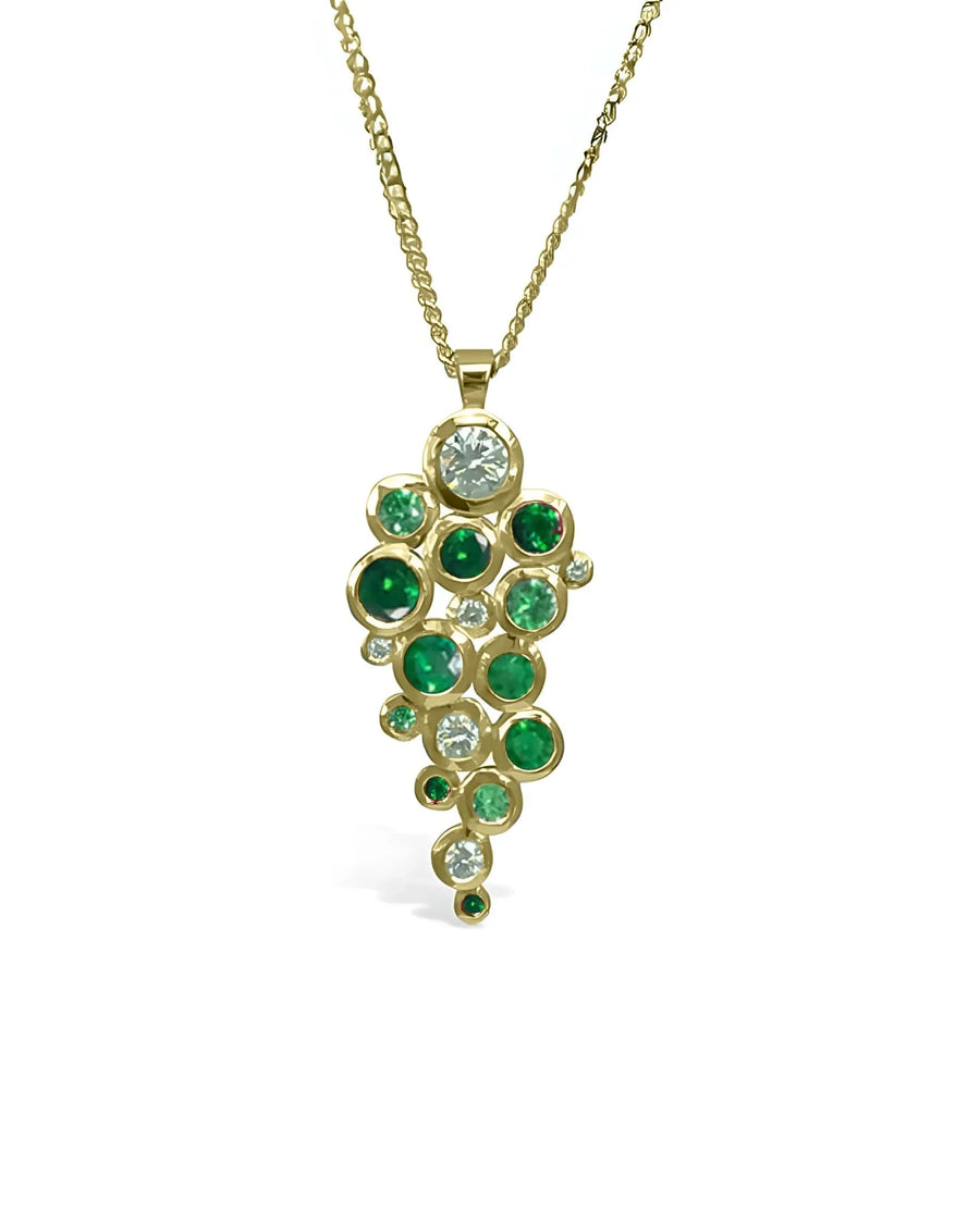 9ct yellow gold pendant with cluster of emeralds and diamonds.