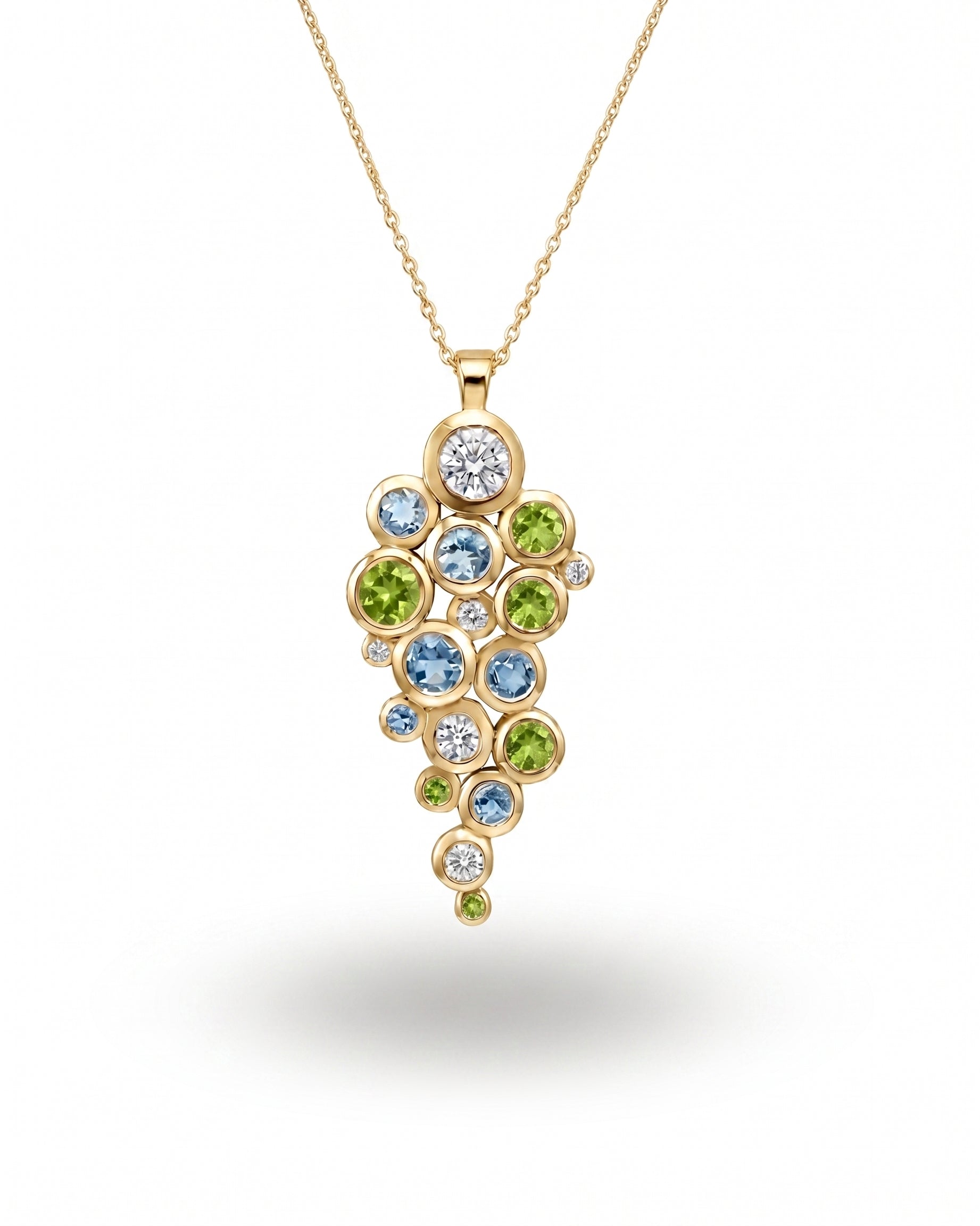 9ct yellow gold pendant with peridot, aquamarine, and diamond cluster.
