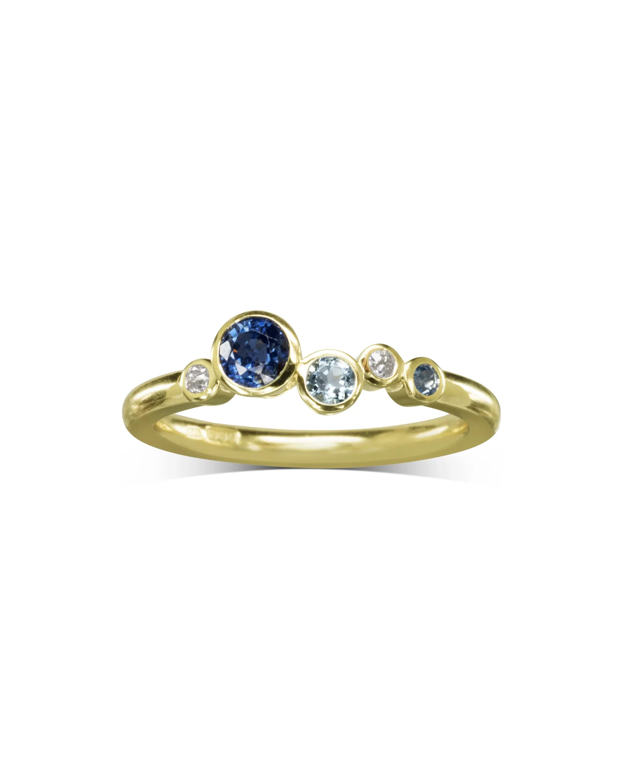 Yellow gold ring with five offset sapphires and diamonds, modern asymmetric design