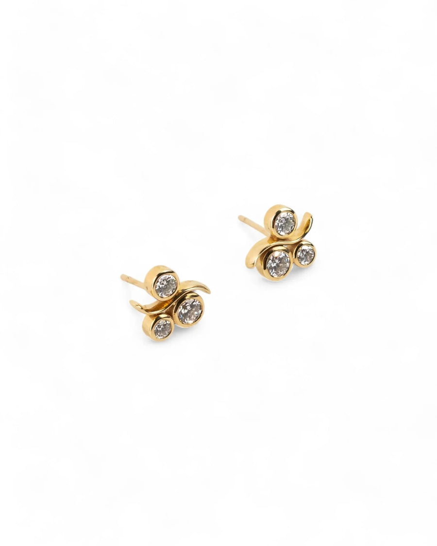 Yellow gold diamond stud earrings with organic bubble design on white background