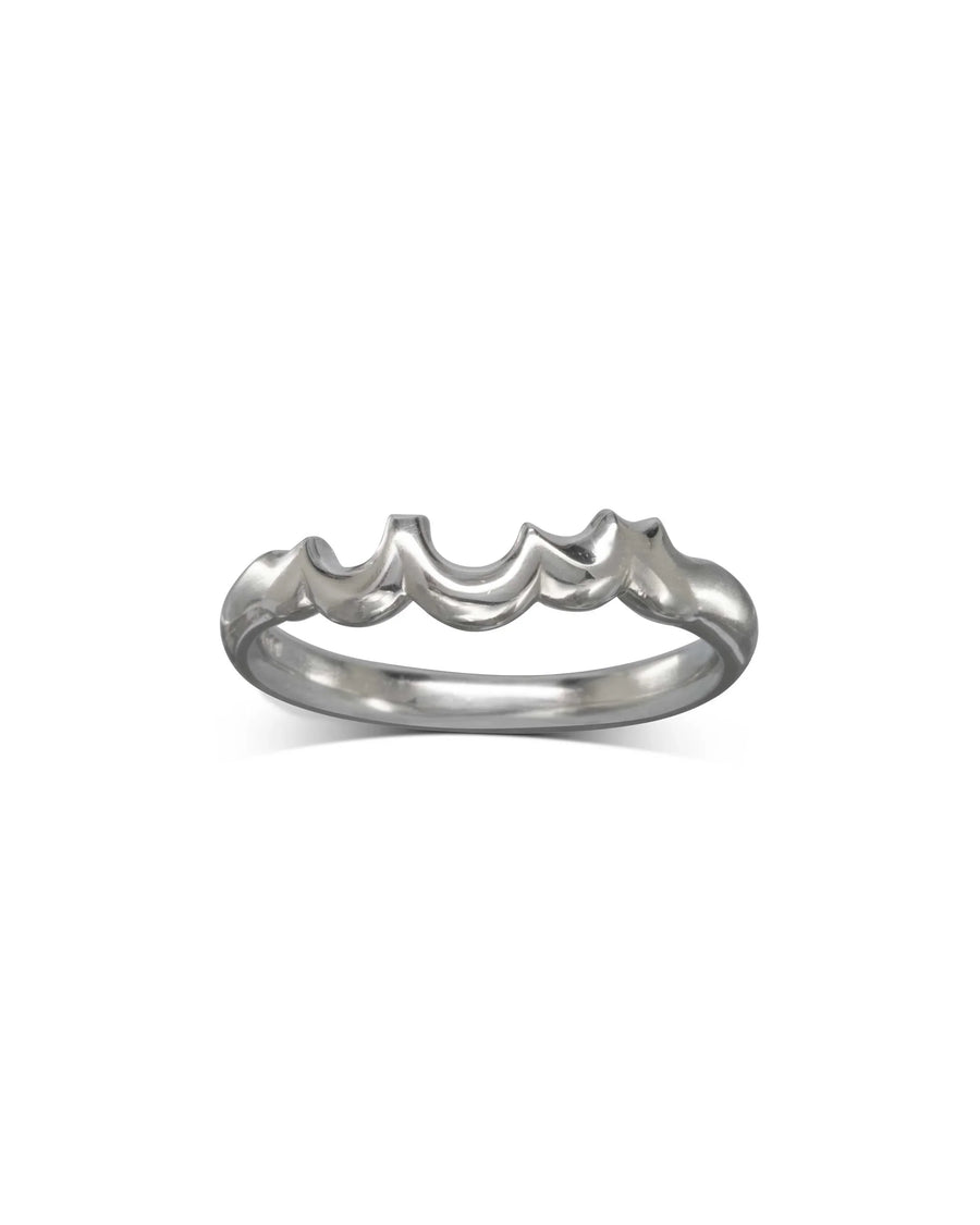 Silver wedding band with a water bubbles shaped design.