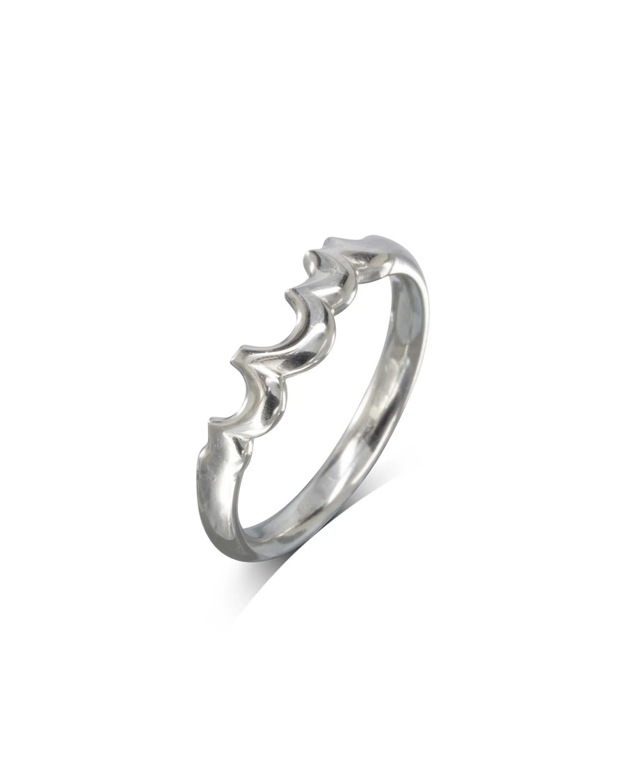 Silver wedding band with a wavy, water bubbles shaped design.