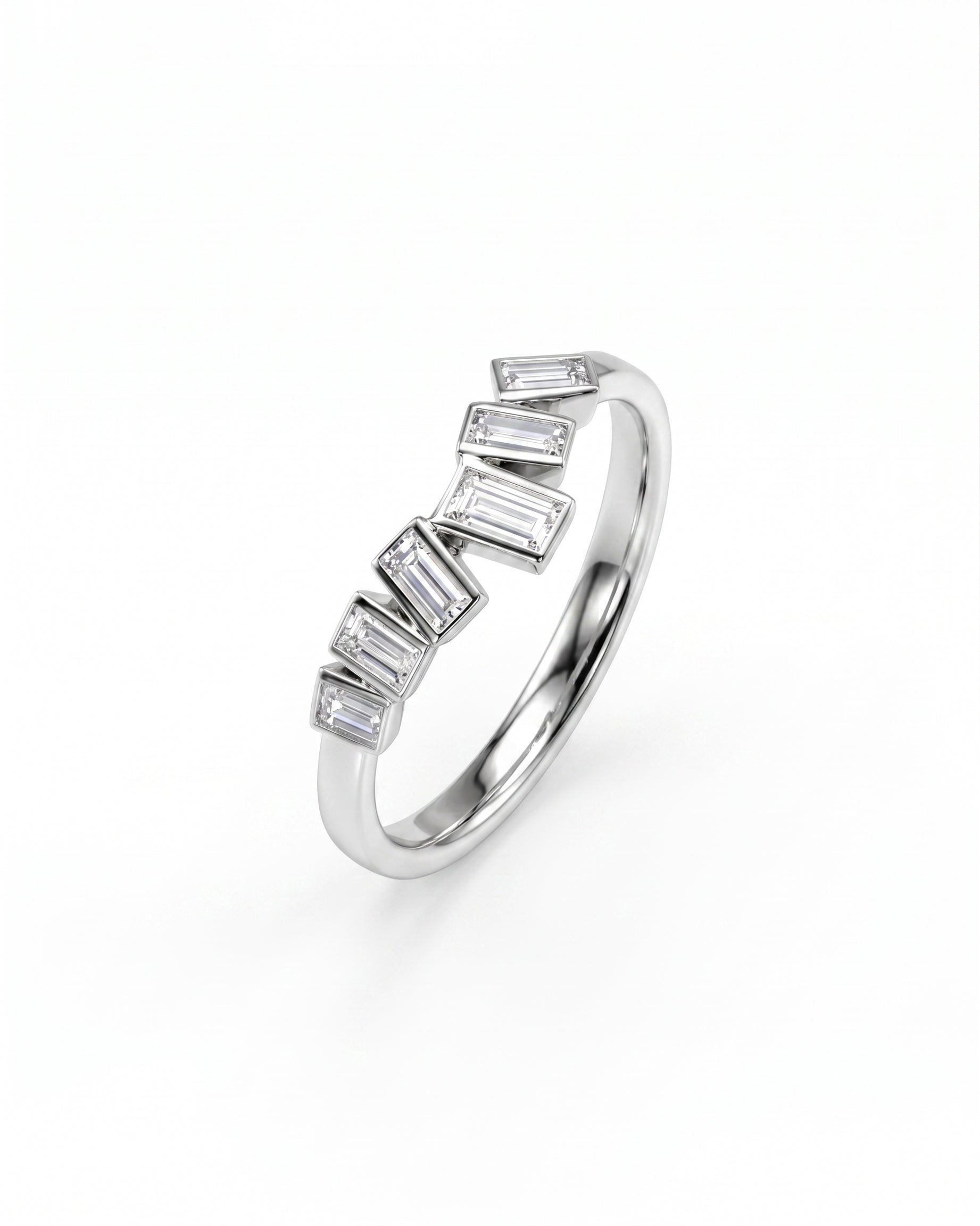 Silver curved ring with baguette diamonds.