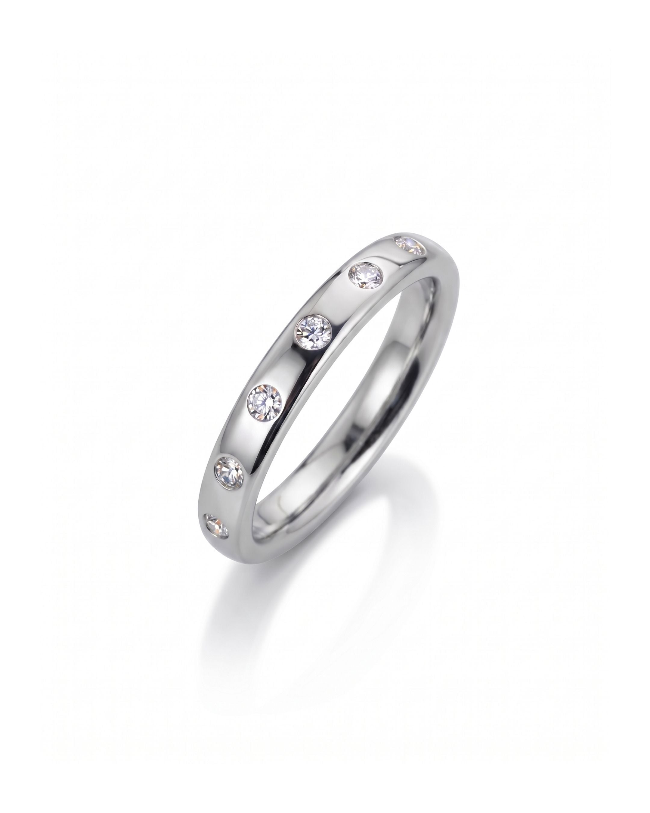 Platinum wedding ring with flush set diamonds.