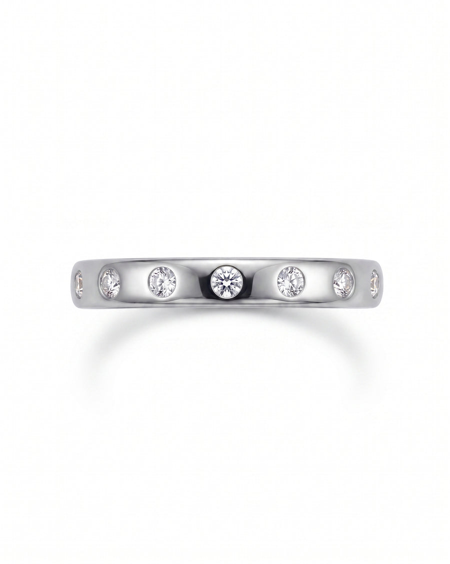 White gold wedding ring with flush set diamonds.