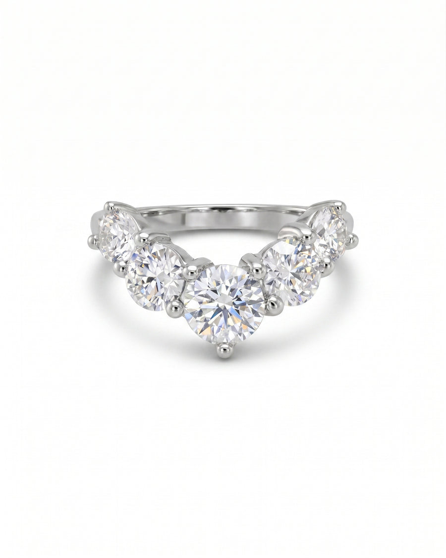 Silver wishbone fitted ring with five round diamonds.