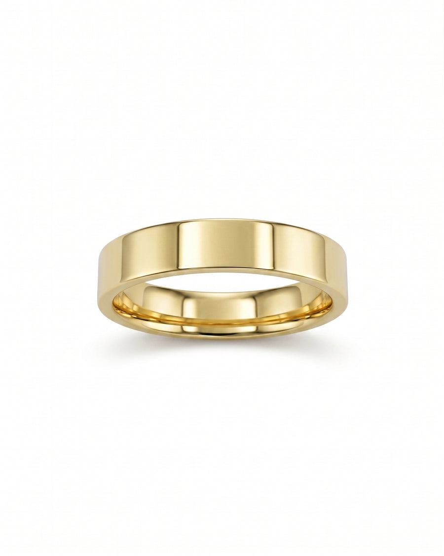 Polished yellow gold flat wedding band.
