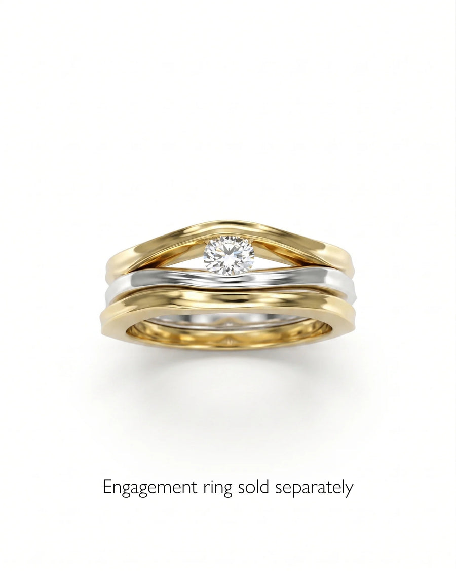 Gold and silver side hammered dainty wedding ring with a single round diamond.