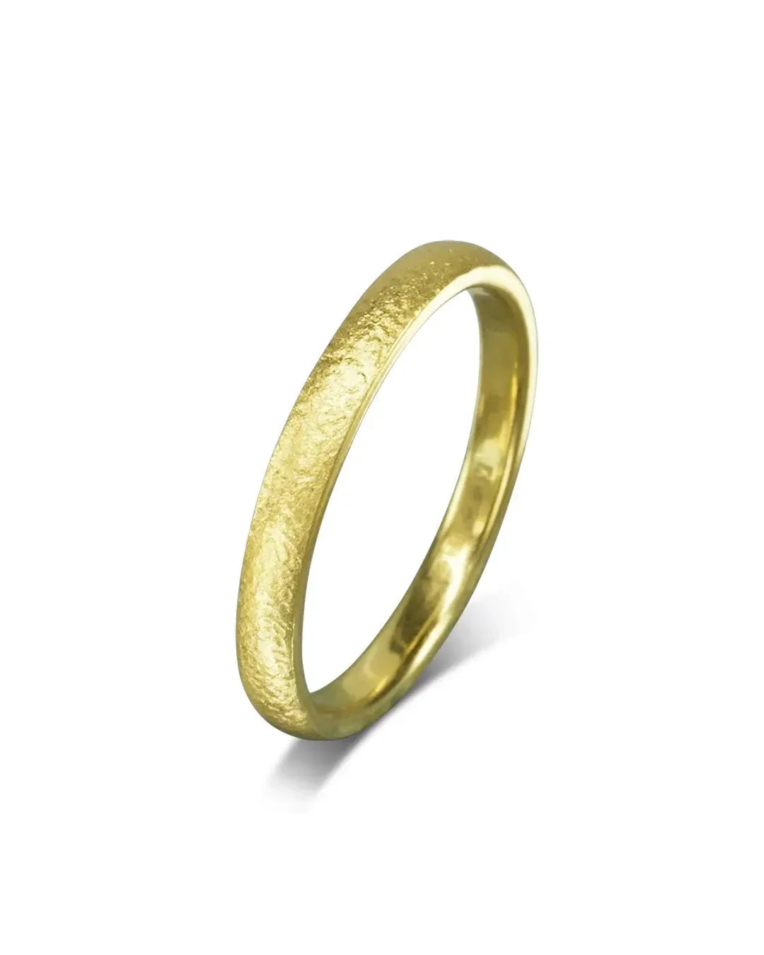 Textured yellow gold wedding band with a smooth, organic finish on a white background
