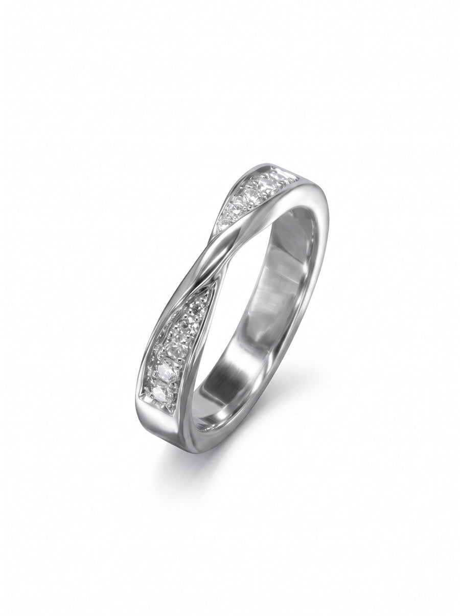 Silver wedding ring with a twisted band design featuring channel-set round diamonds.