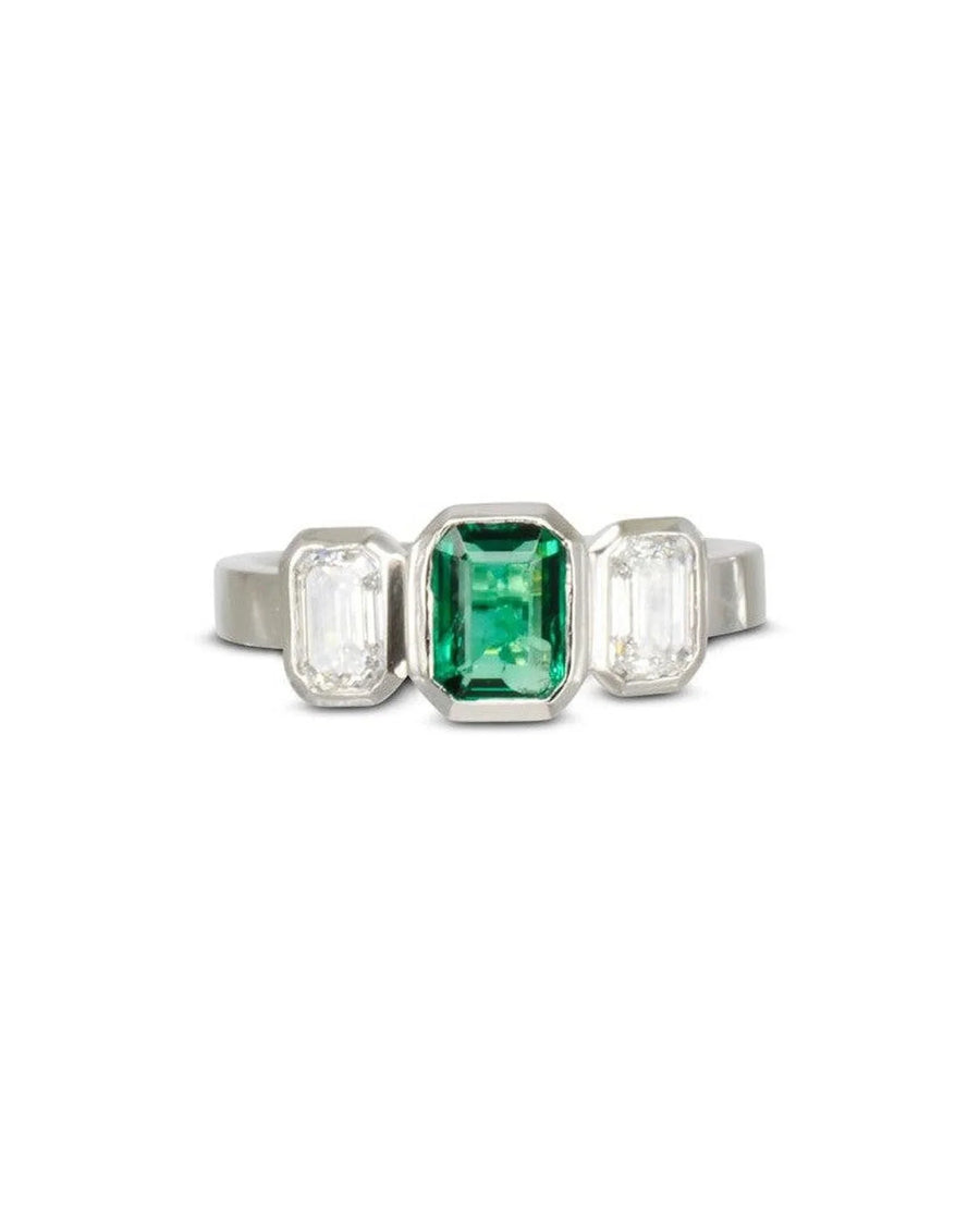 Yellow gold emerald and diamond trilogy ring.