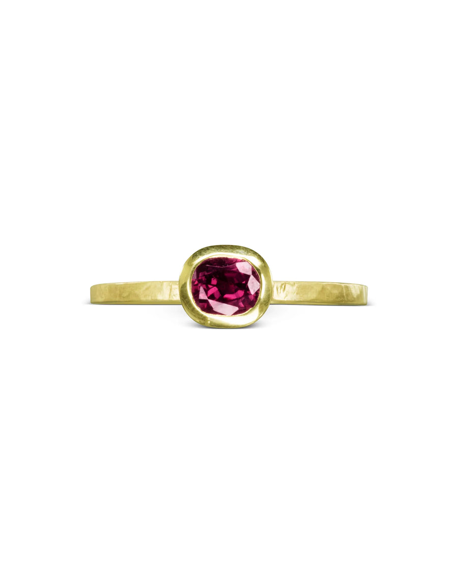 Handmade yellow gold ring with cushion-cut ruby gemstone and textured band