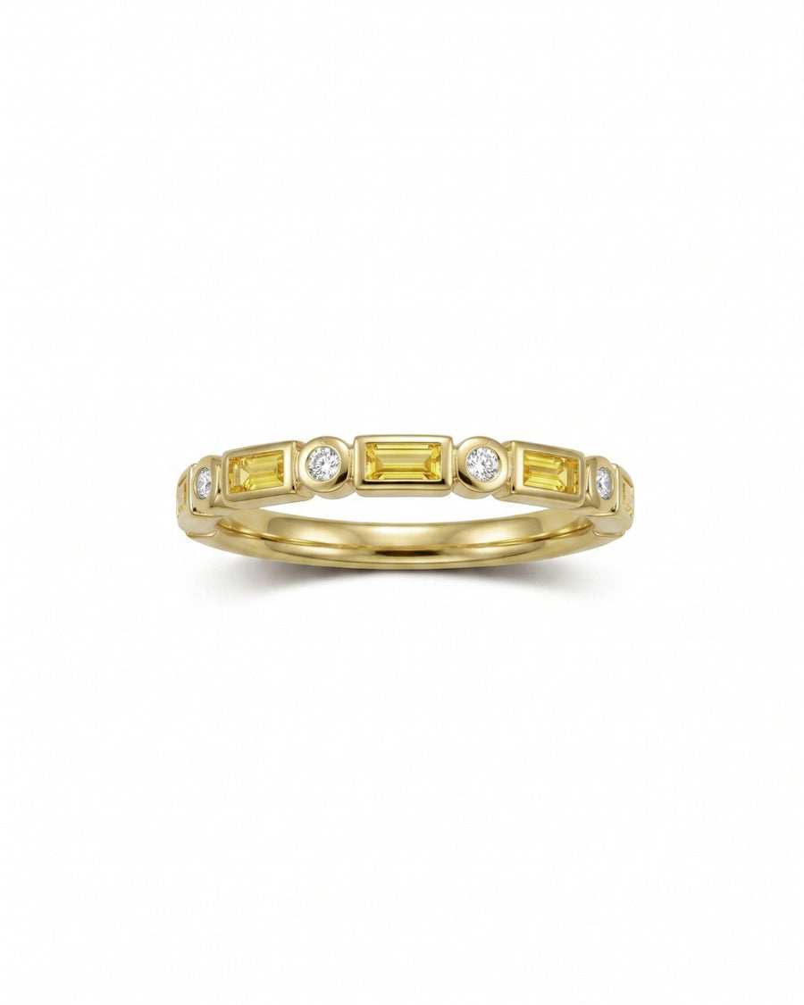Yellow gold eternity ring with alternating yellow sapphires and round diamonds.