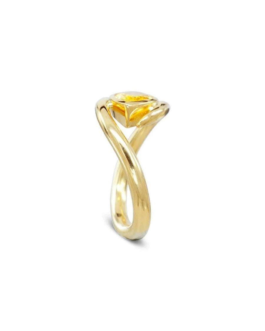 Yellow sapphire gold ring with twisted band and organic modern design