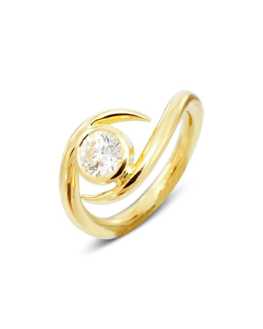 Yellow gold ring with a round diamond in a spiky, modern swirl design