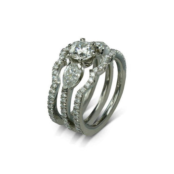 Claw Round and Pear Shaped Diamond Trilogy Ring Ring Pruden and Smith   